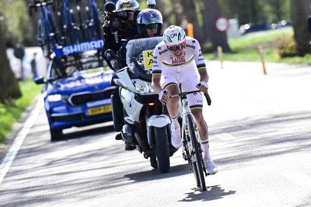Slovenian Tadej Pogacar of UAE Team Emirates pictured in action solo in the final stretch during the men s race of the Ronde van Vlaanderen Tour des Flandres Tour of Flanders one day cycling race, 268,9km from Brugge to Oudenaarde, Sunday 06 April 2025. DIRKxWAEM  x119628487x