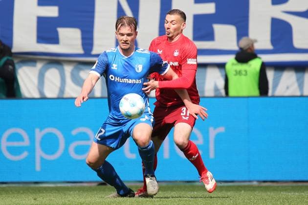 06 04 2025, xmohx, Soccer 2 Bundesliga, 1 FC Magdeburg 1 FC Kaiserslautern v l Alexander Ahl Holmström 1 FC Magdeburg Luca Sirch 1 FC Kaiserslautern Zweikampf, Aktion, action, battle for the ball DFL DFB REGULATIONS PROHIBIT ANY USE OF PHOTOGRAPHS as IMAGE SEQUENCES and or QUASI VIDEO Magdeburg