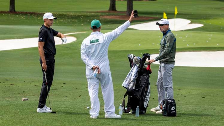 AUGUSTA 20250406 Ludvig Aberg on the driving range with his coach Hans Larsson and caddie Joe Skovron during practice for the US Masters at Augusta National Golf Club Photo Christer Höglund TT code 1019 AUGUSTA USA xx  Copyright: xChristerxHöglund TTx US MASTERS GOLF