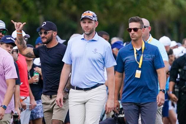 April 6, 2025, Doral, Florida, USA: Eric Trump (C) approaches the first tee before the final round of LIV Golf Miami at Trump National Doral. Doral USA - ZUMAw109 20250406_fap_w109_001 Copyright: xDebbyxWongx