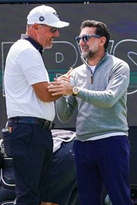 April 6, 2025, Doral, Florida, USA: Phil Mickelson (L), captain of HyFlyers GC, shakes hands with Yasir Al-Rumayyan, governor of the Public Investment Fund (PIF), on the first tee before the final round of LIV Golf Miami at Trump National Doral. Doral USA - ZUMAw109 20250406_fap_w109_016 Copyright: xDebbyxWongx