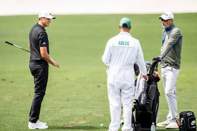 250406 Ludvig Aberg of Sweden with caddie Joe Skovron and coach Hans Larsson during a practice at the range prior to the 2025 Masters Golf Tournament on April 6, 2025 in Augusta Photo Petter Arvidson BILDBYRAN kod PA PA1003 golf masters bbeng the masters augusta sverige  Copyright: PETTERxARVIDSON BB250406PA023
