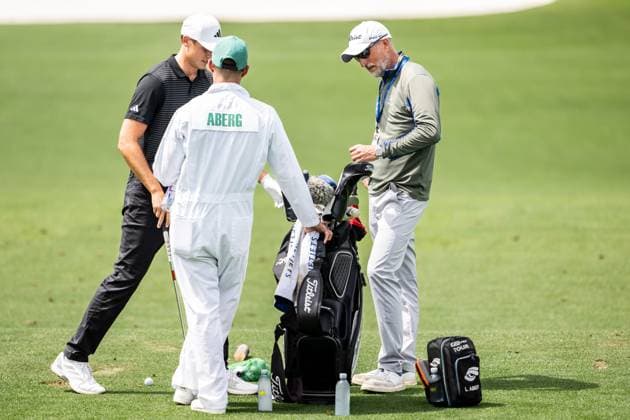 250406 Ludvig Aberg of Sweden with caddie Joe Skovron and coach Hans Larsson during a practice at the range prior to the 2025 Masters Golf Tournament on April 6, 2025 in Augusta Photo Petter Arvidson BILDBYRAN kod PA PA1003 golf masters bbeng the masters augusta sverige  Copyright: PETTERxARVIDSON BB250406PA024