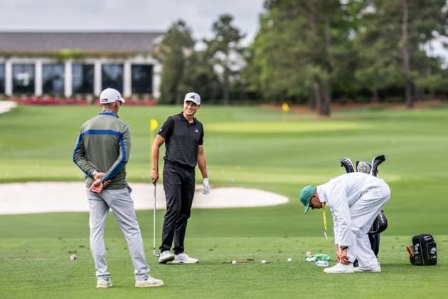 250406 Ludvig Aberg of Sweden with coach Hans Larsson and caddie Joe Skovron during a practice at the range prior to the 2025 Masters Golf Tournament on April 6, 2025 in Augusta Photo Petter Arvidson BILDBYRAN kod PA PA1003 golf masters bbeng the masters augusta sverige  Copyright: PETTERxARVIDSON BB250406PA028