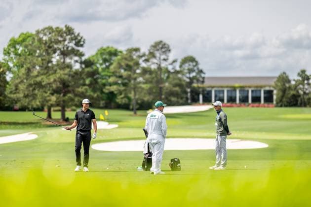 250406 Ludvig Aberg of Sweden with coach Hans Larsson and caddie Joe Skovron during a practice at the range prior to the 2025 Masters Golf Tournament on April 6, 2025 in Augusta Photo Petter Arvidson BILDBYRAN kod PA PA1003 golf masters bbeng the masters augusta sverige  Copyright: PETTERxARVIDSON BB250406PA030