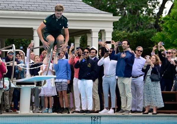 April 6, 2025, Houston, Tx, United States of America: JENSON BROOKSBY takes the traditional plunge after Jenson Brooksby (USA) defeated Frances Tiafoe (USA) 6-6, 6-2 to win the Men s Clay Court Championships on April 3, 2025 at the River Oaks Country Club in Houston, Texas. Houston United States of America - ZUMAw132 20250406_zap_w132_006 Copyright: xTomxWalkox