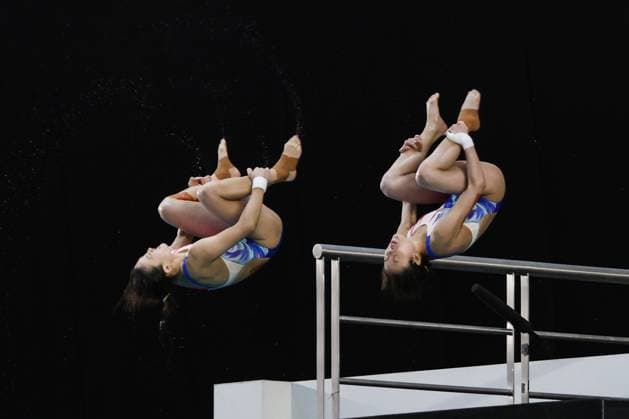 (250407) -- GUADALAJARA, April 7, 2025 -- Zhang Minjie (L) Lu Wei of China compete during the women s synchronized 10m platform final at the World Aquatics Diving World Cup 2025 in Guadalajara, Jalisco, Mexico, on April 6, 2025. (Photo by Xinhua) (SP)MEXICO-JALISCO-GUADALAJARA-DIVING-WORLD CUP-WOMEN S SYNCHRONIZED 10M PLATFORM-FINAL DianaxMarquez 