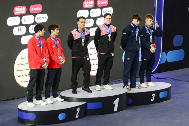 (250407) -- GUADALAJARA, April 7, 2025 -- Gold medalists Juan Manuel Celaya Hernandez (3rd L) Osmar Olvera Ibarra (3rd R)of Mexico, silver medalists Hu Yukang (1st L) Zheng Jiuyuan (2nd L)of China and bronze medalists Anthony Harding (2nd R) Jack Laugher of Britain attend the awarding ceremony for the men s synchronized 3m springboard event at the World Aquatics Diving World Cup 2025 in Guadalajara, Jalisco, Mexico, on April 6, 2025. (Photo by Xinhua) (SP)MEXICO-JALISCO-GUADALAJARA-DIVING-WORLD CUP-MEN S SYNCHRONIZED 3M SPRINGBOARD-FINAL DianaxMarquez 
