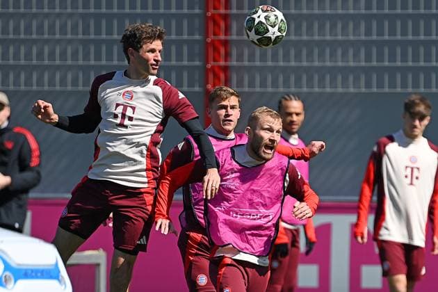 Thomas MUELLER MÜLLER,Bayern Muenchen , action,duel against Konrad LAIMER Bayern Muenchen , final training Soccer Champions League quarterfinal FC Bayern Muenchen Inter Milan on 08 04 2025 , A L L I A N Z A R E N A