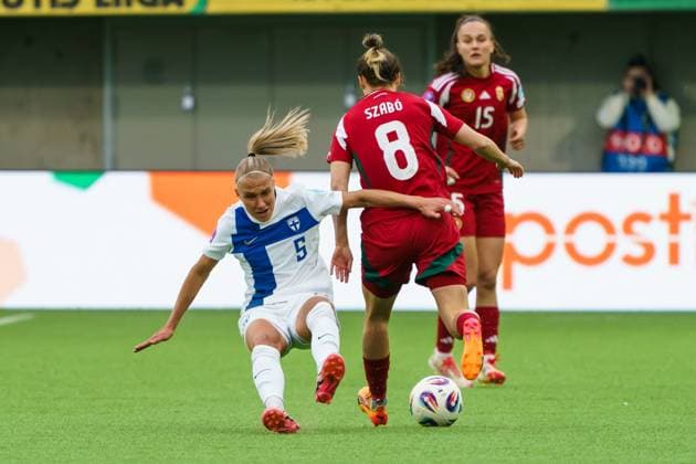 Emma Koivisto (L) of Finland falls on the field while fighting for the ball with Viktoria Szabo of Hungary during the Women s UEFA Nations League Group B3 football match between Finland and Hungary in Tampere, Finland, on April 8, 2025. Tampere TAMMELAN STADION PIRKANMAA Finland LKFTVX20250408193008YXZI  Copyright: xMikaxKylmäniemix LKFTVX20250408193008YXZI