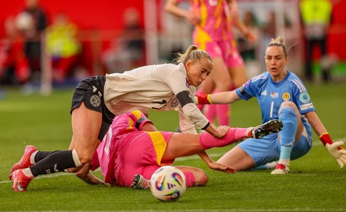 GER, Wolfsburg, Germany vs Scotland, International match, Football, DFB, Season 2024 2025, Volkswagen Arena, Nations League, 4 Matchday in picture f l Lea Schüller Germany 11 in duel in penalty area with Leah Eddie Scotland 5 DFB DFL REGULATIONS PROHIBIT ANY USE OF PHOTOGRAPHS AS IMAGE SEQUENCES AND OR QUASI VIDEO, 08 04 2025, Copyright: HMBxMedia HendrikxHamelau