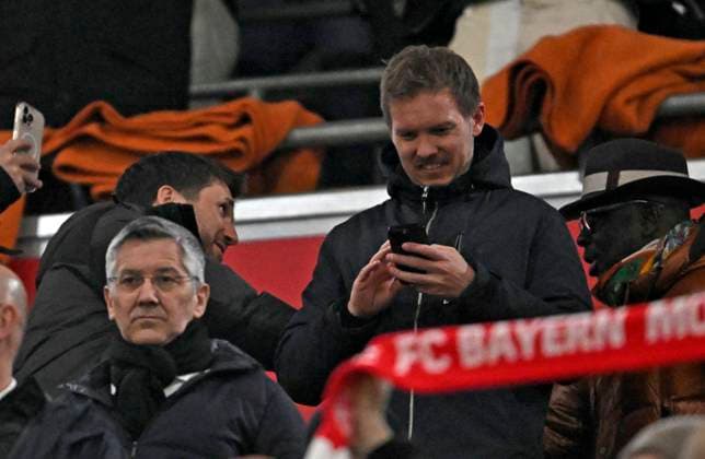 08 04 2025, Football UEFA Champions League 2024 2025 quarter-final first leg, FC Bayern Munich Inter Milan, at Allianz Arena Munich Coach Julian Nagelsmann Germany is above President Herbert Hainer FC Bayern DFL and DFB regulations prohibit any use of photographs as image sequences and or quasi video