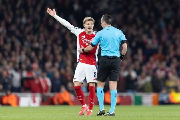 Arsenal v Real Madrid. UEFA Champions League, Quarter-Final, Leg 1 of 2, Football, The Emirates Stadium, London, UK - 08 Apr 2025 Martin Odegaard of Arsenal FC reacts to Referee Irfan Peljto (BIH) London Emirates Stadium London GBR, UK NEWSPAPERS OUT Copyright: xEllixBirchx