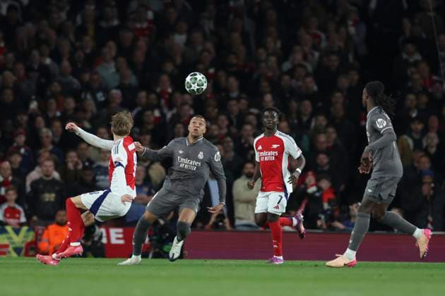 April 8, 2025, London, England, UNITED KINGDOM: Kylian Mbappe of Real Madrid and Martin Odegaard of Arsenal in action during the UEFA Champions League 2024 25 Quarter Final First Leg match between Arsenal FC and Real Madrid C.F. at Arsenal Stadium on April 08, 2025 in London, England. London UNITED KINGDOM - ZUMAa181 20250408_zaa_a181_098 Copyright: xIsbelxInfantesx