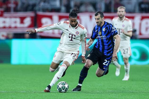 Soccer Champions League quarter final FC Bayern Munich Inter Milan on 08 04 2025 at the Allianz Arena in Munich Michael Olise Munich , left Henrikh Mkhitaryan Milan , right xMSx