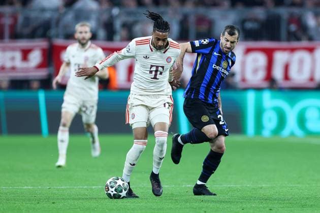 Soccer Champions League quarter final FC Bayern Munich Inter Milan on 08 04 2025 at the Allianz Arena in Munich Michael Olise Munich , left Henrikh Mkhitaryan Milan , right xMSx