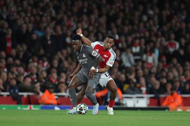 April 8, 2025, London, England, UNITED KINGDOM: Jurrien Timber of Arsenal and Vinicius Junior of Real Madrid in action during the UEFA Champions League 2024 25 Quarter Final First Leg match between Arsenal FC and Real Madrid C.F. at Arsenal Stadium on April 08, 2025 in London, England. London UNITED KINGDOM - ZUMAa181 20250408_zaa_a181_102 Copyright: xIsbelxInfantesx