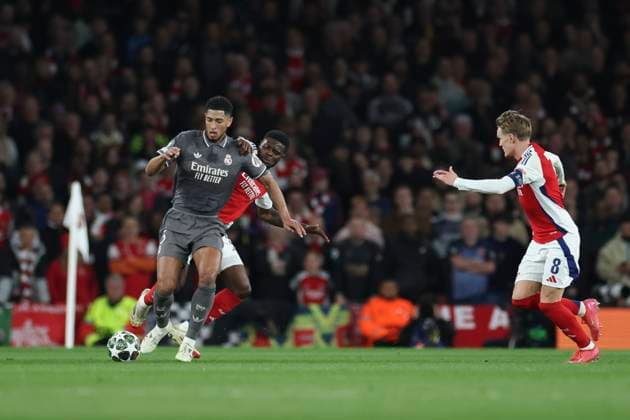 April 8, 2025, London, England, UNITED KINGDOM: Jude Bellingham of Real Madrid and Thomas Partey of Arsenal in action during the UEFA Champions League 2024 25 Quarter Final First Leg match between Arsenal FC and Real Madrid C.F. at Arsenal Stadium on April 08, 2025 in London, England. London UNITED KINGDOM - ZUMAa181 20250408_zaa_a181_106 Copyright: xIsbelxInfantesx