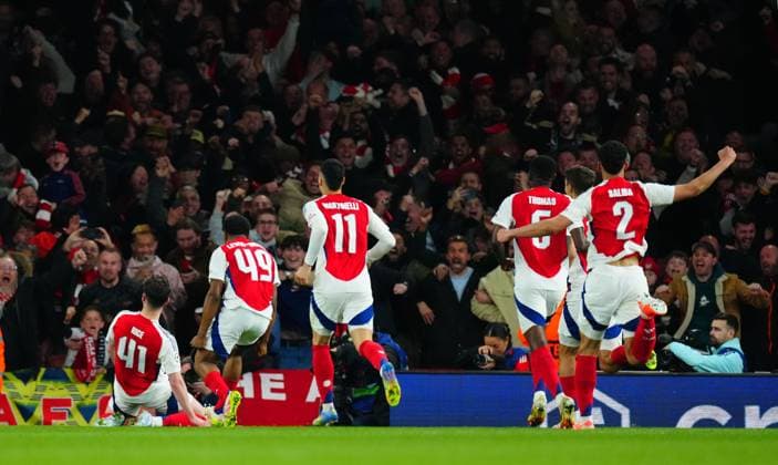 Declan Rice of Arsenal celebrates scoring a goal to make the score 1-0 Arsenal v Real Madrid, UEFA Champions League, Quarter Final, First Leg, Football, Emirates Stadium, London, UK - 08 Apr 2025 EDITORIAL USE ONLY No use with unauthorised audio, video, data, fixture lists, club league logos or live services. Online in-match use limited to 120 images, no video emulation. No use in betting, games or single club league player publications. Copyright: xJavierxGarcia Shutterstockx 15243595ao