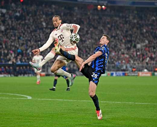 08 04 2025, Football UEFA Champions League 2024 2025 quarter-final first leg, FC Bayern Munich Inter Milan, at Allianz Arena Munich v l Leroy Sane Bayern Munich v Benjamin Pavard Inter Milan DFL and DFB regulations prohibit any use of photographs as image sequences and or quasi video