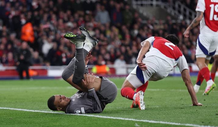 London, England, 8th April 2025. Kylian Mbappe of Real Madrid ends up on his back during the Arsenal vs Real Madrid UEFA Champions League match at the Emirates Stadium, London. Picture credit should read: David Klein Sportimage EDITORIAL USE ONLY. No use with unauthorised audio, video, data, fixture lists, club league logos or live services. Online in-match use limited to 120 images, no video emulation. No use in betting, games or single club league player publications. SPI_053_DK_Arsenal_Real_Madrid SPI-3819-0061