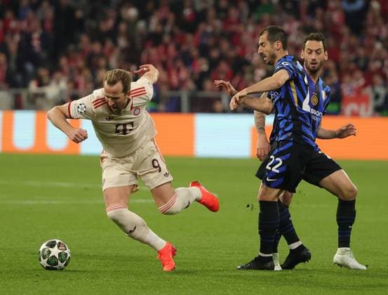 (250409) -- MUNICH, April 9, 2025 -- Harry Kane (L) of Bayern Munich gets fouled during the UEFA Champions League quarterfinal 1st leg football match between Bayern Munich and Inter Milan in Munich, Germany, April 8, 2025. (Photo by Xinhua) (SP)GERMANY-MUNICH-FOOTBALL-UEFA CHAMPIONS LEAGUE-BAYERN MUNICH VS INTER MILAN PhilippexRuiz 