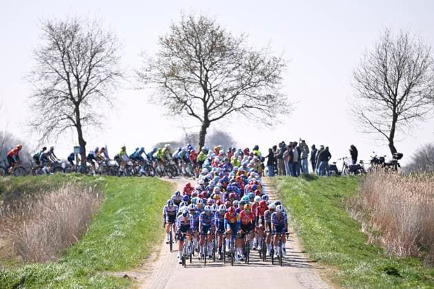 Scheldeprijs 2025 cycling race SCHOTEN, BELGIUM - APRIL 09 : Merlier Tim (BEL) of Soudal Quick-Step and the peloton during the Men Elite UCI 1.Pro 113th Flanders Classics Scheldeprijs cycling race with start in Terneuzen and finish in Schoten (205,2 km) on April 09, 2025 in Schoten, Belgium, 09 04 2025 ( Motordriver Guy De Vuyst & Schoten Belgium  Copyright: xTomasxSiskx