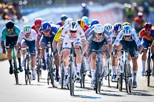 Belgian Tim Merlier of Soudal Quick-Step celebrates as he crosses the finish line to win the men s race of the 113th edition of the Scheldeprijs one day cycling event, 202,8 km from Terneuzen, the Netherlands to Schoten, Belgium on Wednesday 09 April 2025. ERICxLALMAND  x120393316x