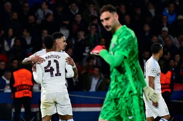 FOOTBALL : PSG vs Aston Villa - Ligue des Champions - 09 04 2025 Morgan Rogers ( 27 - Aston Villa ) celebrates with Jacob Ramsey ( 41 - Aston Villa ) during the UEFA Champions League match between Paris Saint Germain and Aston Villa FC at Parc Des Princes on April 09 , 2025 in Paris, France. ( Photo by Dante Badano PsnewZ ) - ParisFrance  Copyright: xDantexBadanox