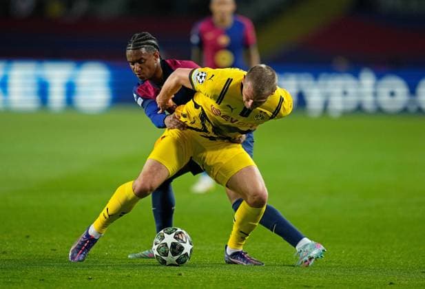 09 04 2025, xslx, Football UEFA Champions League, FC Barcelona Borussia Dortmund v l Julian Ryerson Borussia Dortmund , Alejandro Balde FC Barcelona UEFA REGULATIONS PROHIBIT ANY USE OF PHOTOGRAPHS as IMAGE SEQUENCES and or QUASI VIDEO Barcelona