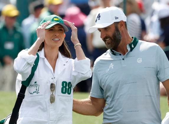 Dustin Johnson and his wife Paulina Gretzky take part in the 2025 Masters Par 3 Contest at Augusta National Golf Club in Augusta, Georgia, on Wednesday, April 9, 2025. The 2025 Masters Golf tournament begins on Thursday, April 10.  AUG20250409878 JOHNxANGELILLO