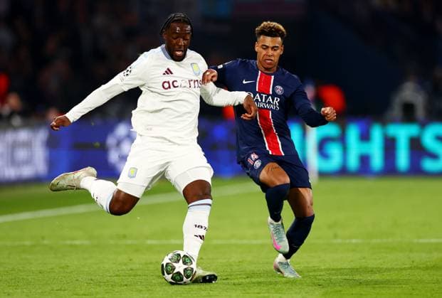 Axel Disasi of Aston Villa and Desire Doue of Paris Saint-Germain. Paris Saint-Germain v Aston Villa, UEFA Champions League, Quarter-Finals, 1st Leg, Football, Parc des Princes, Paris, France - 09 Apr 2025 EDITORIAL USE ONLY No use with unauthorised audio, video, data, fixture lists, club league logos or live services. Online in-match use limited to 120 images, no video emulation. No use in betting, games or single club league player publications.  Copyright: xJamesxMarsh Shutterstockx 15243606ck