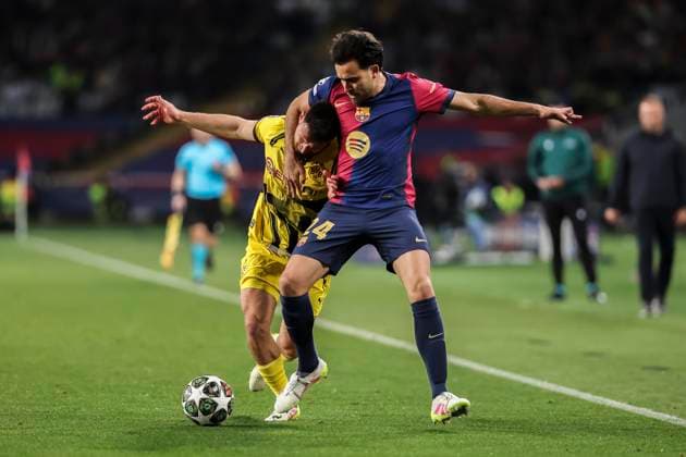 April 9, 2025, Barcelona, Barcelona, SPAIN: Eric Garcia of FC Barcelona, Barca and Salih Ozcan of Borussia Dortmund compete for the ball during the UEFA Champions League 2024 25 quarter-final first leg, match between FC Barcelona and Borussia Dortmund at Estadi Olimpic Lluis Companys on April 09, 2025 in Barcelona, Spain. Barcelona SPAIN - ZUMAa181 20250409_zaa_a181_112 Copyright: xJavierxBorregox
