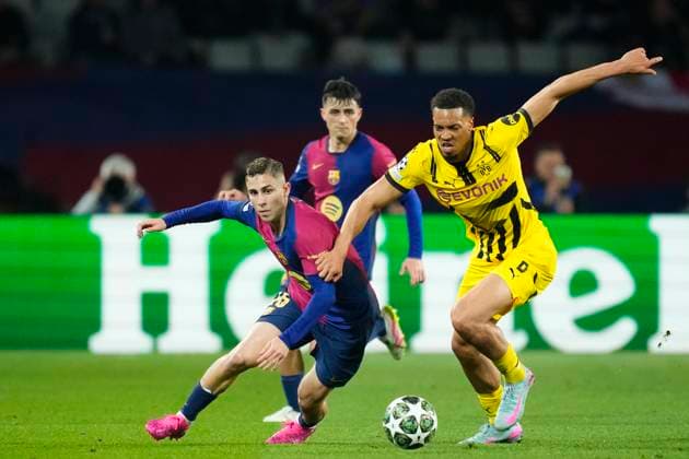 FC Barcelona, Barca v Borussia Dortmund - UEFA Champions League 2024 25 Quarter Final First Leg Fermin Lopez central midfield of Barcelona and Spain and Felix Nmecha central midfield of Borussia Dortmund and Germany compete for the ball during the UEFA Champions League 2024 25 Quarter Final First Leg match between FC Barcelona and Borussia Dortmund at Estadi Olimpic Lluis Companys on April 9, 2025 in Barcelona, Spain. Barcelona Spain  Copyright: xJosexBretonx originalFilename:bretonhernandez-fcbarcel250409_npghE.jpg
