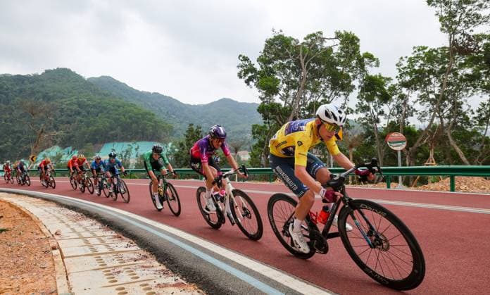(250410) -- DONGFANG, April 10, 2025 -- Kyrylo Tsarenko (1st R) of Solution Tech Vini Fantini competes during Stage 4 at the 16th Tour of Hainan cycling race from Baoting to Dongfang, south China s Hainan Province, April 10, 2025. ) (SP)CHINA-HAINAN-DONGFANG-CYCLING-TOUR OF HAINAN (CN) YangxGuanyu 