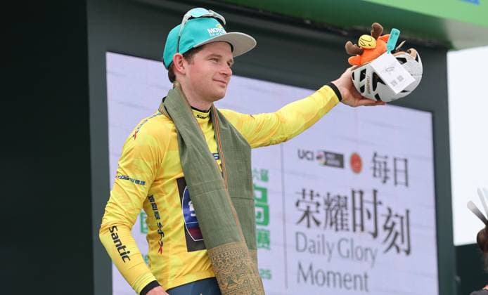 (250410) -- DONGFANG, April 10, 2025 -- Kyrylo Tsarenko of Solution Tech Vini Fantini celebrates in the yellow jersey during the awarding ceremony after Stage 4 at the 16th Tour of Hainan cycling race from Baoting to Dongfang, south China s Hainan Province, April 10, 2025. ) (SP)CHINA-HAINAN-DONGFANG-CYCLING-TOUR OF HAINAN (CN) YangxGuanyu 