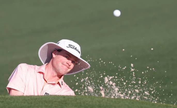 Joe Highsmith hits out of a bunker on the second hole.during round one of the 2025 Masters golf tournament at Augusta National Golf Club in Augusta, Georgia, on Thursday, April 10, 2025.  AUG20250410501 TANNENxMAURY