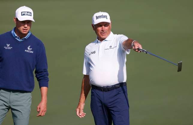 Fred Couples (R) discusses a shot with Harris English on the second hole during the first round of the Masters golf tournament at Augusta National Golf Club in Augusta, Georgia on Thursday, April 10, 2025.  AUG20250410518 TANNENxMAURY