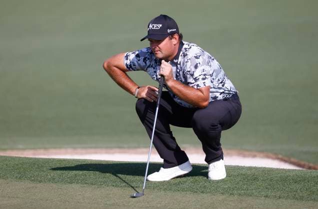 Patrick Reed lines up a putt on the second hole during the first round of the Masters golf tournament at Augusta National Golf Club in Augusta, Georgia on Thursday, April 10, 2025.  AUG20250410524 TANNENxMAURY