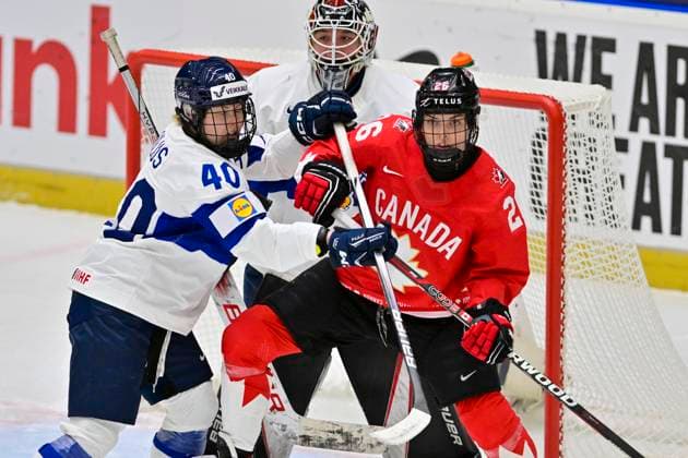 L-R Noora Tulus (FIN), goalkeeper Emilia Kyrkko (FIN) and Emily Clark (CAN) in action during the IIHF Women s World Championship, WM, Weltmeisterschaft Group A, match Canada vs Finland, in Ceske Budejovice, Czech Republic, on April 10, 2025. (CTKxPhoto VaclavxPancer) CTKPhotoP2025041008775  CTKPhotoP2025041008775