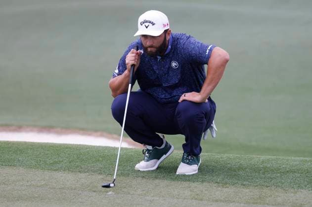 Jon Rahm of Spain lines up a putt on the second hole during the first round of the Masters golf tournament at Augusta National Golf Club in Augusta, Georgia on Thursday, April 10, 2025.  AUG20250410616 TANNENxMAURY