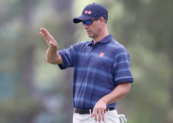 Adam Scott of Australia lines up a putt on the third green during the first round of the Masters golf tournament at Augusta National Golf Club in Augusta, Georgia on Thursday, April 10, 2025.  AUG20250410619 JOHNxANGELILLO