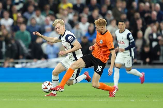10th April 2025; Tottenham Hotspur Stadium, London, England; UEFA Europa League Quarter Final First Leg Football, Tottenham Hotspur versus Eintracht Frankfurt; Lucas Bergvall of Tottenham feels pressure from Hugo Larsson of Eintracht Frankfurt  ActionPlus12772820 HenningxVonxJagow