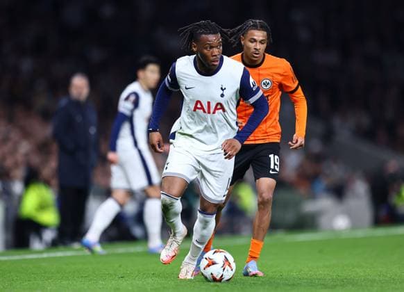 Destiny Udogie of Tottenham Hotspur and Jean-Matteo Bahoya of Eintracht Frankfurt Tottenham Hotspur v Eintracht Frankfurt, UEFA Europa League, Quarter Final, First Leg, Football, Tottenham Hotspur Stadium, London, UK - 10 Apr 2025 EDITORIAL USE ONLY No use with unauthorised audio, video, data, fixture lists, club league logos or live services. Online in-match use limited to 120 images, no video emulation. No use in betting, games or single club league player publications.  Copyright: xMichaelxZemanek Shutterstockx 15243632ag