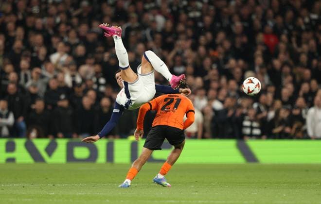 Pedro Porro (TH) Nathaniel Brown (EF) at the Tottenham Hotspur v Eintracht Frankfurt UEFA Europa League match, at the Tottenham Hotspur Stadium, London, UK on 10th April, 2025. 