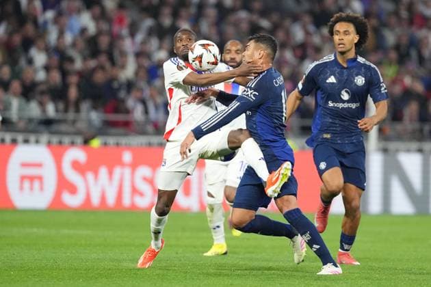 Casemiro of Man Utd and Clinton Mata of Lyon compete Olympique Lyonnais v Manchester United, ManU UEFA Europa League, Quarter Final, First Leg, Football, Groupama Stadium, Lyon, France - 10 Apr 2025 EDITORIAL USE ONLY No use with unauthorised audio, video, data, fixture lists, club league logos or live services. Online in-match use limited to 120 images, no video emulation. No use in betting, games or single club league player publications. Copyright: xDavexWinter Shutterstockx 15243617br