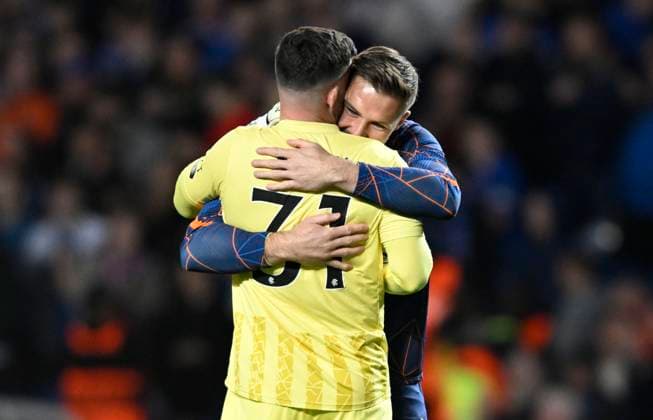 Glasgow, Scotland, 10th April 2025. Penalty hero Liam Kelly of Rangers is congratulated by Jack Butland of Rangers at full-time after the Rangers vs Athletic Bilbao UEFA Europa League match at Ibrox Stadium, Glasgow. Picture credit should read: Neil Hanna Sportimage EDITORIAL USE ONLY. No use with unauthorised audio, video, data, fixture lists, club league logos or live services. Online in-match use limited to 120 images, no video emulation. No use in betting, games or single club league player publications. SPI_037_NH_Rangers_AthleticClub SPI-3841-0037