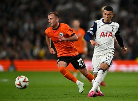 Tottenham Hotspur V Eintracht Frankfurt, Europa League. Pedro Porro (Spurs) and Mario Gotze (Frankfurt) during the Tottenham Hotspur V Eintracht Frankfurt UEFA Europa Conference League quarter-final match at the Tottenham Hotspur Stadium, London. Tottenham Tottenham Hotspur Stadium UK Copyright: xMartinxDaltonx Spurs_v_Frankfurt_100425_MD_016