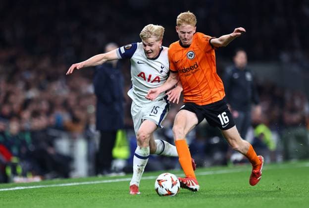 Lucas Bergvall of Tottenham Hotspur competes for the ball with Hugo Larsson of Eintracht Frankfurt Tottenham Hotspur v Eintracht Frankfurt, UEFA Europa League, Quarter Final, First Leg, Football, Tottenham Hotspur Stadium, London, UK - 10 Apr 2025 EDITORIAL USE ONLY No use with unauthorised audio, video, data, fixture lists, club league logos or live services. Online in-match use limited to 120 images, no video emulation. No use in betting, games or single club league player publications. Copyright: xMichaelxZemanek Shutterstockx 15243632dv