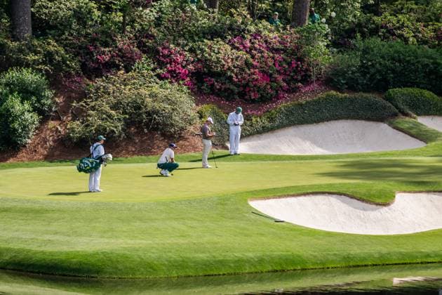 250410 Ludvig Aberg of Sweden and Rory McIlroy of Northern Ireland on the 12th green during the first round of the 2025 Masters Golf Tournament on April 10, 2025 in Augusta Photo Petter Arvidson BILDBYRAN kod PA PA1007 bbeng golf masters the masters augusta us masters sverige Amen Corner  Copyright: PETTERxARVIDSON BB250410PA202